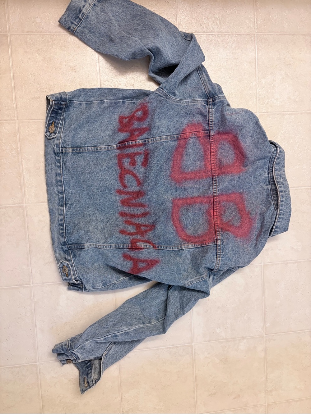 Custom Light Blue Denim Jacket with Red Spray-Paint Accent